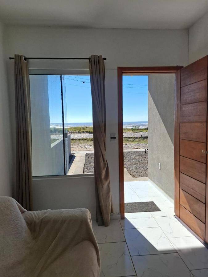 Casas e apartamentos de temporada para 4 pessoas, com vista e balcão em Tramandaí