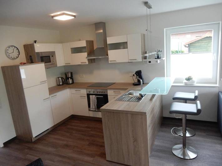 Ferienwohnung für 4 Personen, mit Balkon und Terrasse sowie Garten und Ausblick in Horumersiel