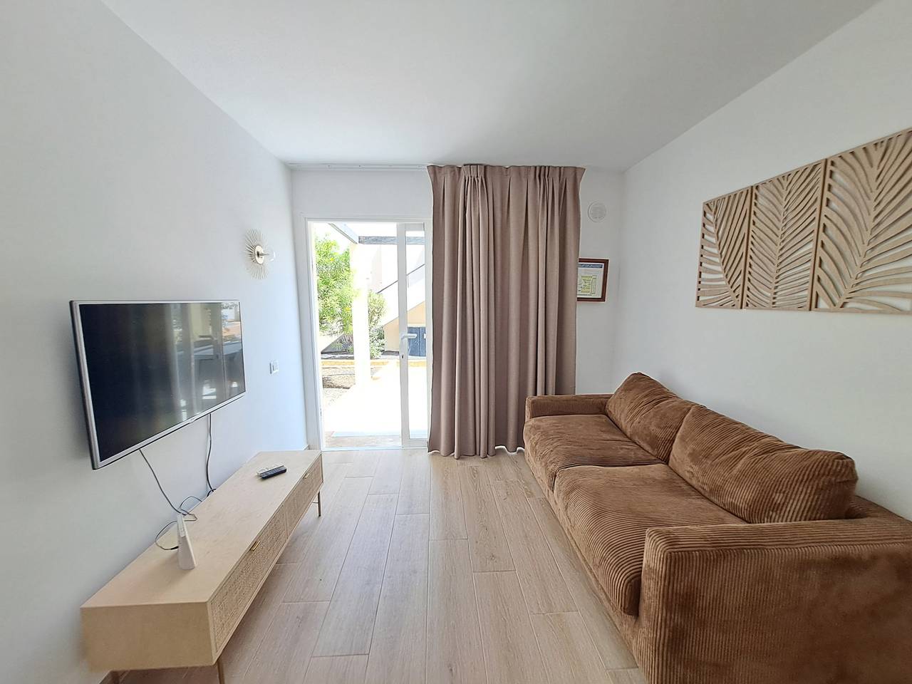 Apartamento entero, Apartamento, terraza, piscina, primera línea de playa en Corralejo - Home For Guest in Corralejo, La Oliva
