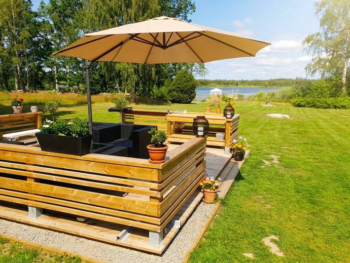 Ferienhaus direkt am See Åsnen (Achtung: Kein Strom und fliessend Wasser) in Åsnen