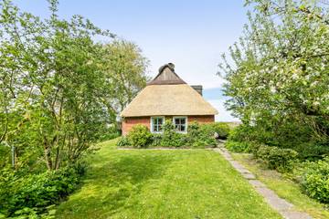 Ferienhaus 'Achtern Diek' mit privater Terrasse, Garten und WLAN