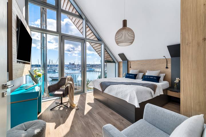 Ferienhaus mit Meerblick für 8 Personen, mit Seeblick und Balkon sowie Ausblick und Sauna in Heiligenhafen
