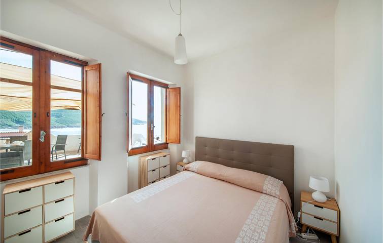 Apartamento vacacional entero, Acogedor refugio junto a la playa: WiFi, AC, Cocina -600m a la Playa in Porto Palma, Arbus (Municipio)