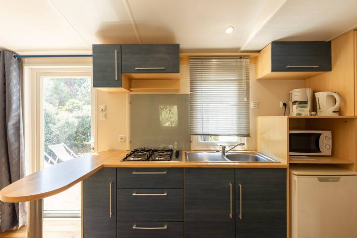 Mobil home pour 4 personnes, avec jardin ainsi que sauna et bassin pour enfant à Palasca - 4