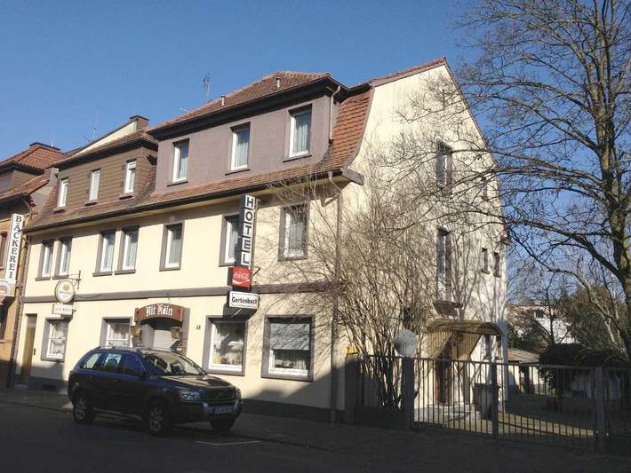 Hotel, mit Garten in Mühlheim am Main
