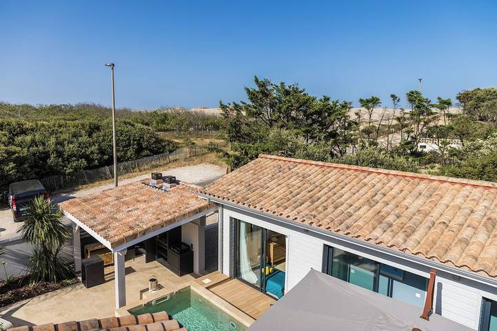 Location de vacances pour 10 personnes, avec Terrasse ainsi que Jardin et Piscine dans Hourtin Plage