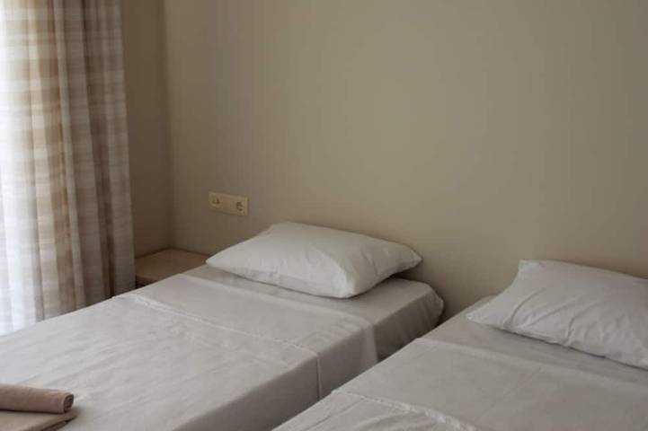 Ganze Wohnung, Erdgeschosswohnung auf einem privaten Komplex mit Gärten und Schwimmbad in Fethiye, Türkische Ägäis