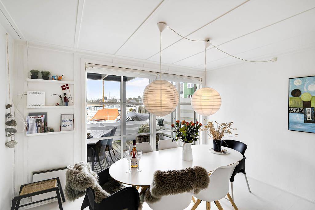 Well-designed two-floor holiday apartment with a lovely view of the marina in Øer Maritime Holiday Village and close to activities, nature and the beach. in Øerne, Ebeltoft