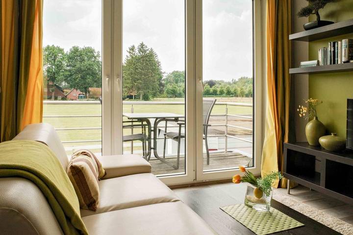 Ferienwohnung für 3 Personen, mit Balkon und Garten in Rostrup