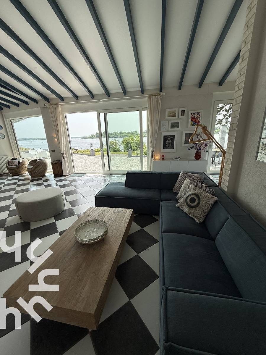Vrijstaande 6-persoons woning aan het Veerse Meer met panoramisch uitzicht in Kortgene, Nederlandse Noordzeekust