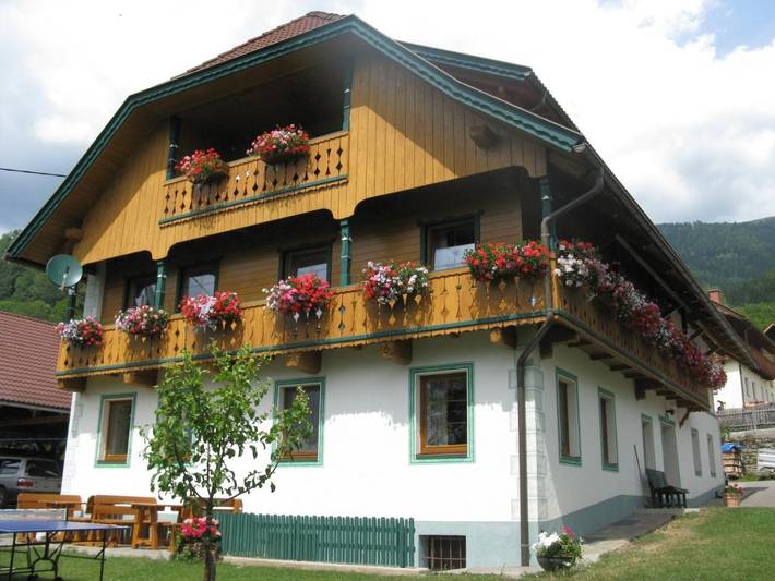Ferienwohnung für 4 Personen, mit Terrasse und Garten sowie Seeblick und Ausblick