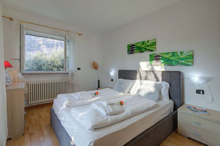 Entire apartment, Agritur Laura - Armonia Verde 1 with Shared Garden, Torbole sul Garda, Italy in Torbole, Nago-Torbole