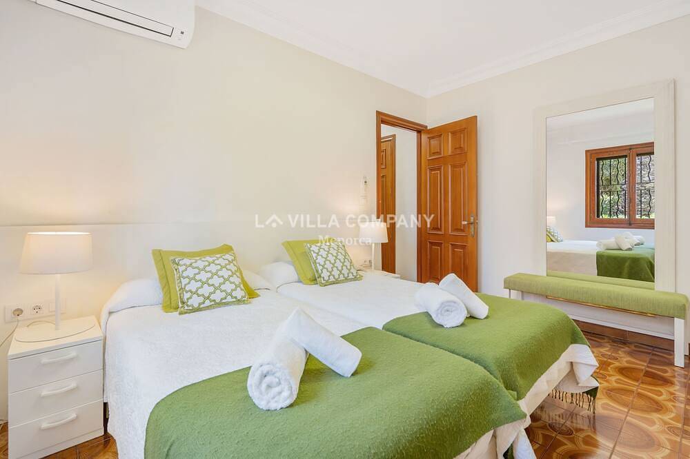 Beachfront Bliss: Captivating Views & Sleeps 9 - Your Perfect Villa Getaway in Santo Tomas, Es Migjorn Gran