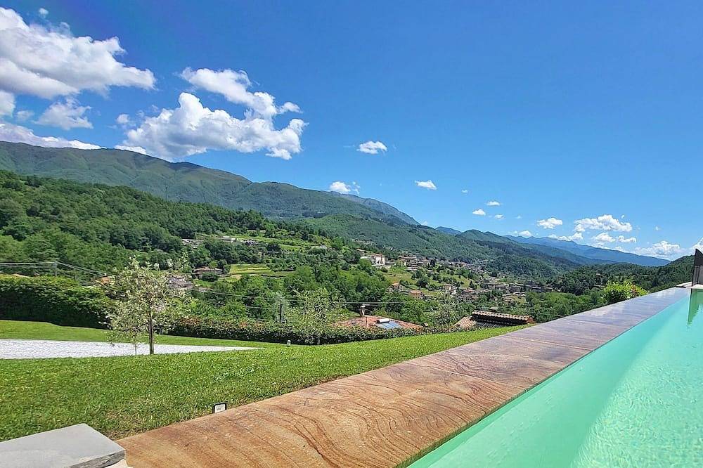 Magnolia, Luxusvilla, privater beheizter Pool, Wifi, Restaurant, Kochoption! in Piazza al Serchio, Garfagnana