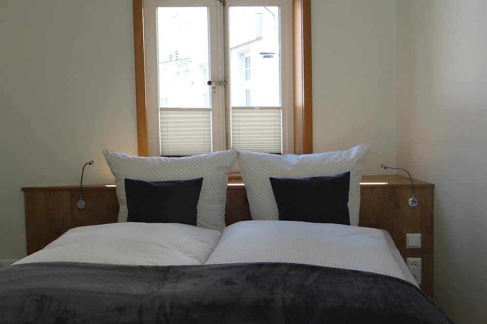 Ganze Wohnung, Modernes Appartement mit Kamin in denkmalgeschütztem Fachwerkhaus am Marktplatz in Bad Essen, Wiehengebirge