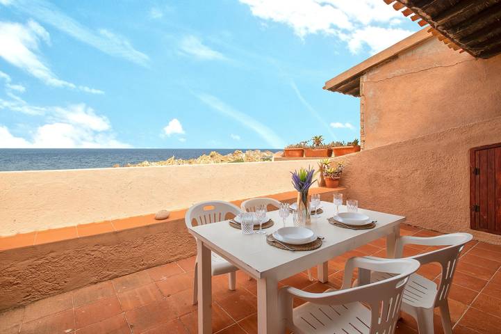 Ferienhaus 'Appartamento Li Tamerici' mit gemeinsamer Terrasse und Klimaanlage in Costa Paradiso, Trinità d'Agultu e Vignola