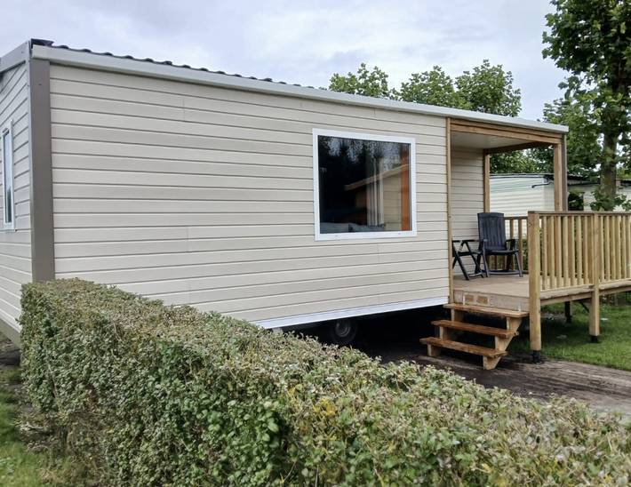 Ferienhaus für 4 Personen, mit Terrasse und Garten sowie Kinderpool und Seeblick