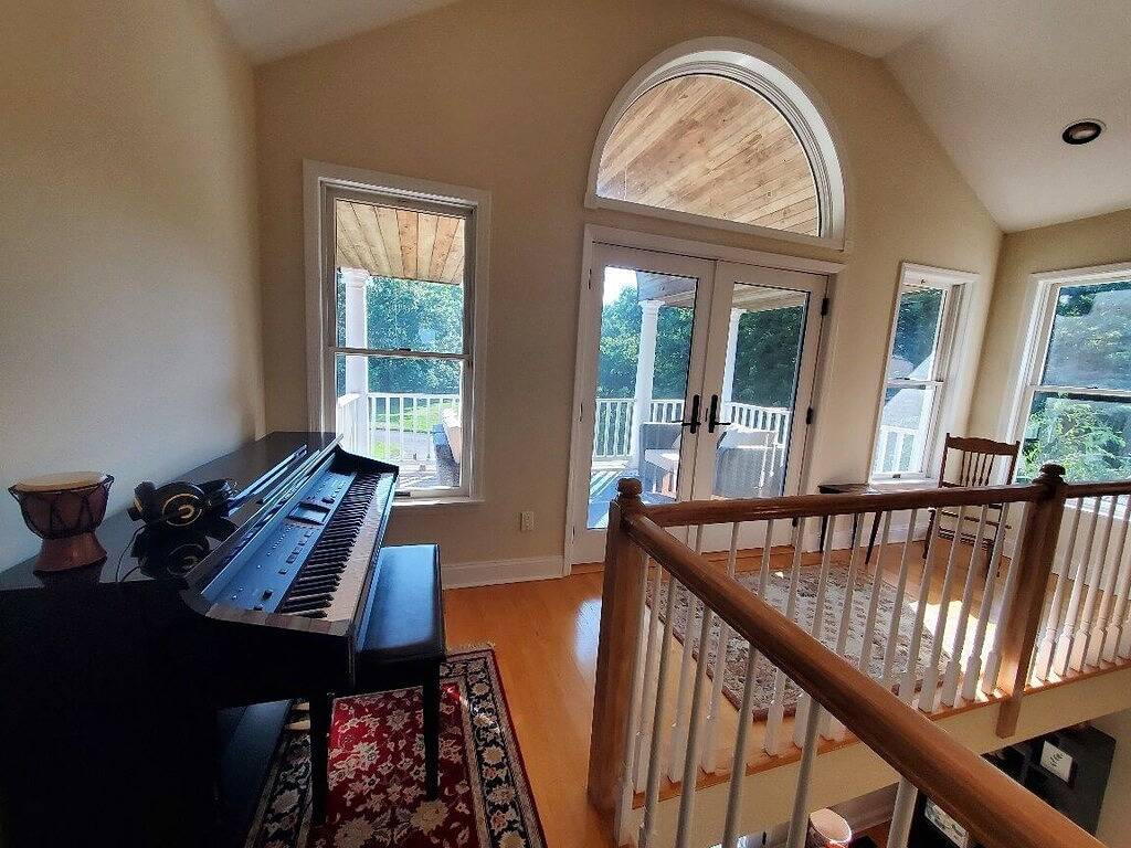 Private, 3-acre, waterfront escape w/pool, firepit, game rm & spectacular views in Mastic, North Fork