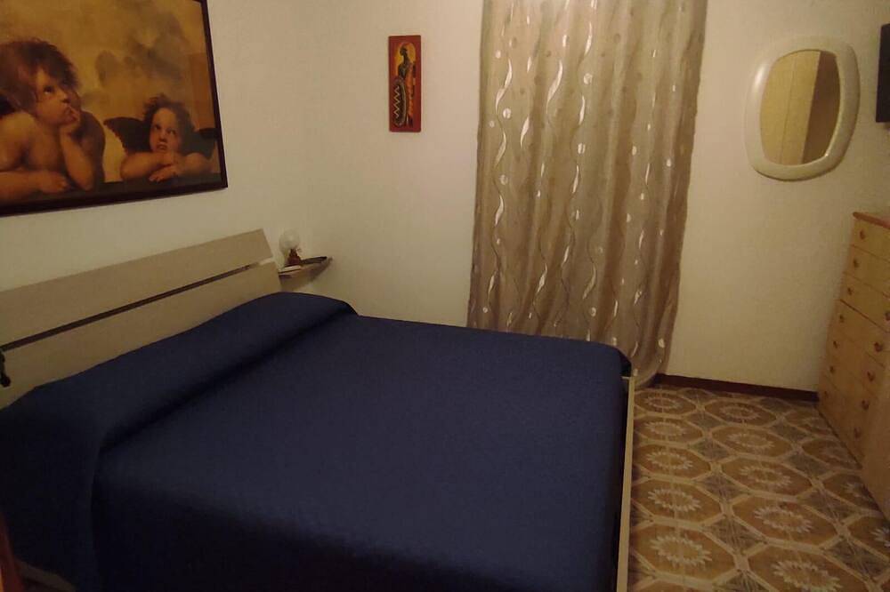 Casa vacanze a pochi passi dal mare, ideale per famiglie con giardino esterno in Leporano, Golfo di Taranto