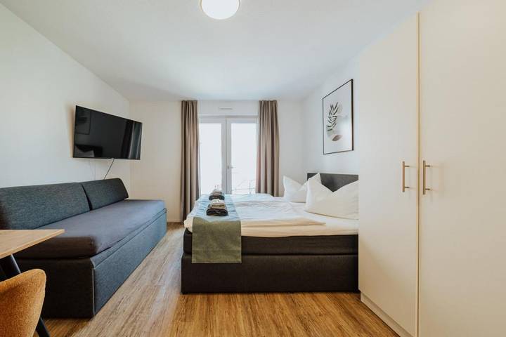 Ferienwohnung für 3 Personen, mit Balkon und Terrasse sowie Garten und Ausblick in Metzingen