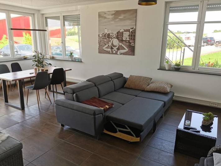 Ferienwohnung für 4 Personen, mit Terrasse und Garten sowie Ausblick in Münsingen