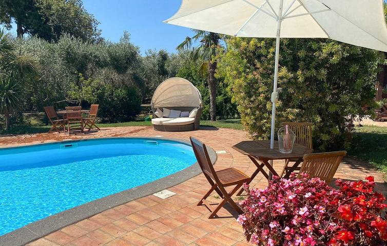 Relaxing 2BR Apartment with Pool & Garden Near Marina Velca City Center in Tarquinia, Viterbo Province