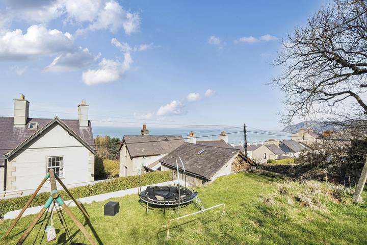 Vakantiehuis voor 9 personen, met tuin en uitzicht op zee, kindvriendelijk in Snowdonia