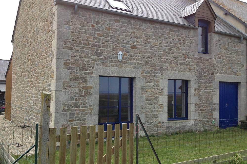House sea frond with views across the Mont Saint Michel bay in Cherrueix, Mont-Saint-Michel Bay