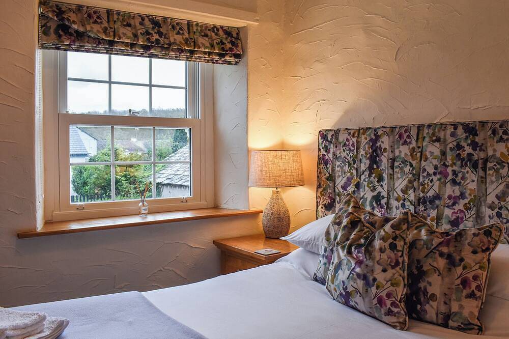 This quaint chocolate box cottage is nestled in the heart of Cartmel village. in Cartmel, Lake District