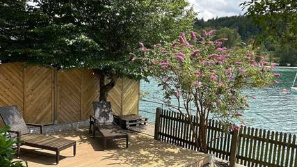 Ferienwohnung für 3 Personen, mit Balkon und Ausblick sowie Garten und Seeblick im Tölzer Land
