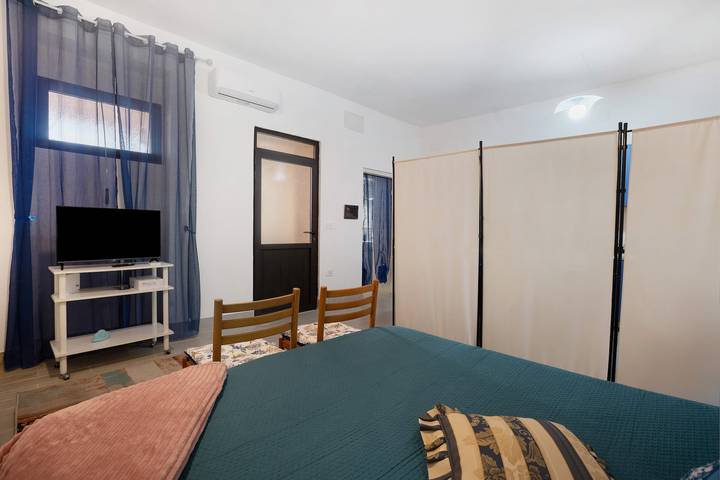 Apartamento entero, Apartamento 'Casa Nina' con jardín privado, Wi-Fi y aire acondicionado in Sedini, Provincia de Sassari