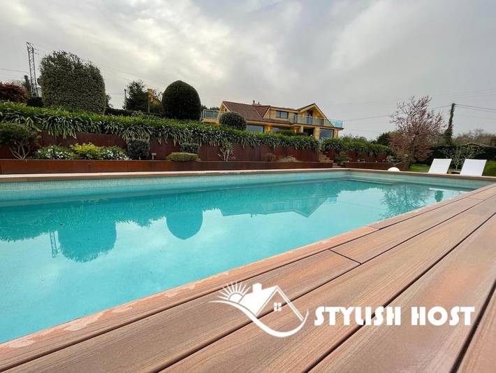 Chalet para 9 personas, con vistas al lago y piscina además de vistas y jardín en Costa de Cantabria