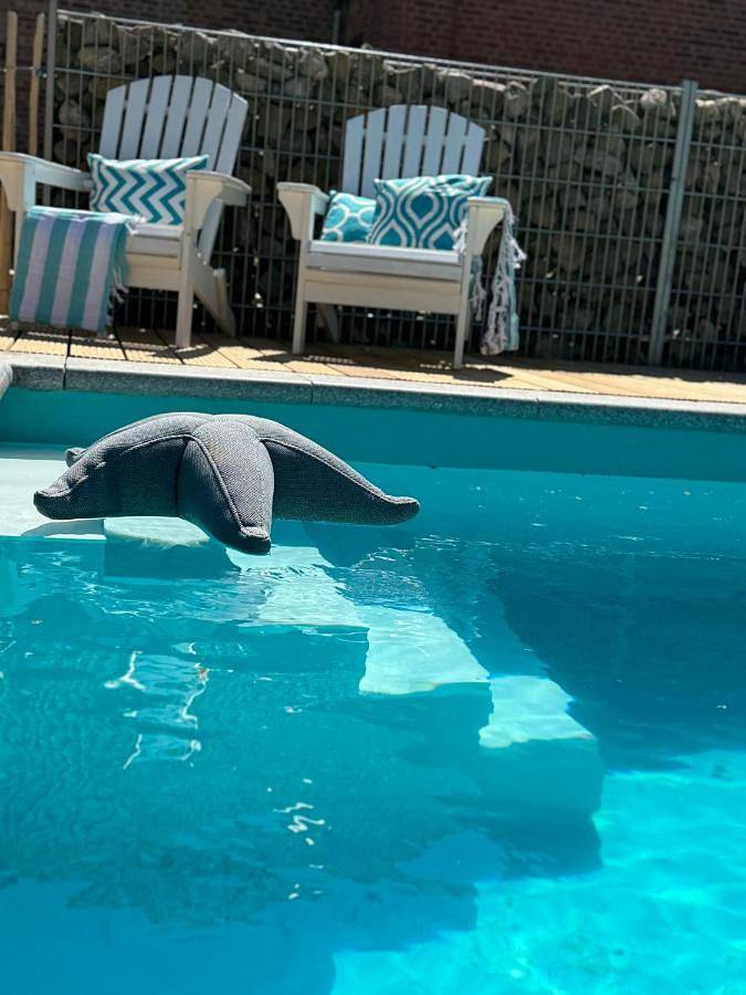 Ferienwohnung für 4 Personen, mit Terrasse und Garten sowie Pool