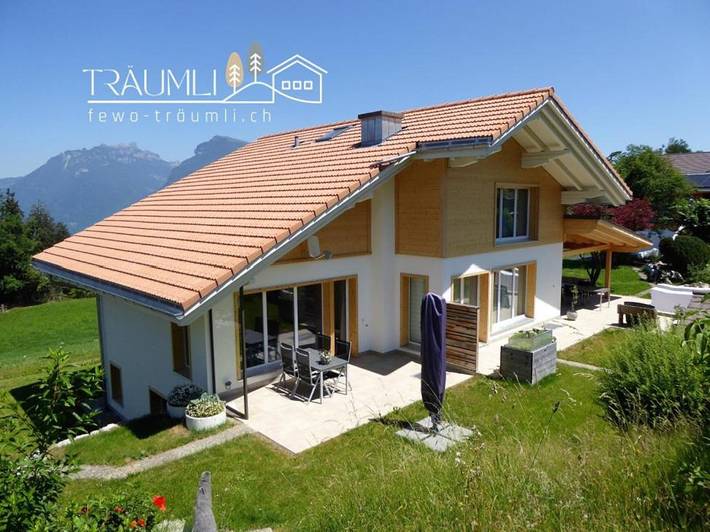 Ferienwohnung für 4 Personen, mit Terrasse und Garten sowie Seeblick und Ausblick in Aeschi bei Spiez