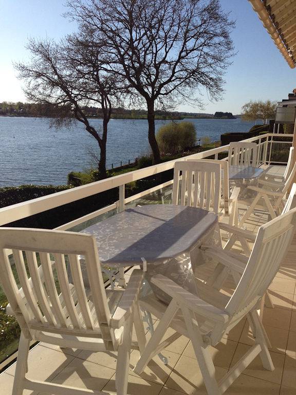 Appartement de vacances pour 14 personnes, avec Balcon et Terrasse ainsi que Jardin et Vue sur le lac