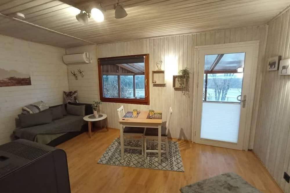 Ferienhaus Waldhäuschen - Ferienhaus, Dusche, Wc, 1 Schlafraum in Pfalzfeld, Hunsrück