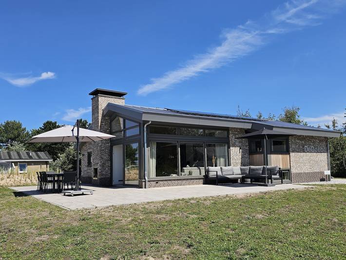 Vakantiehuis voor 10 personen, with Balkon/Terras and Terras as well as Tuin and Sauna op Ameland