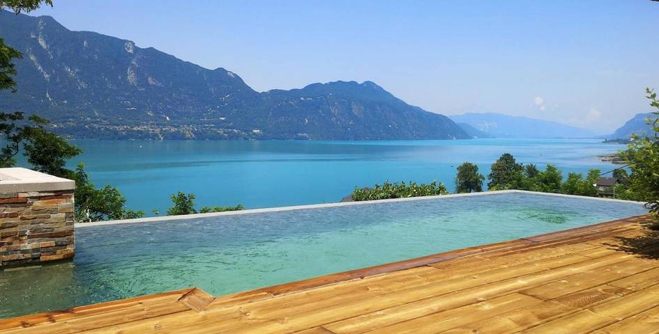 Hôtel pour 4 personnes, avec vue et piscine ainsi que vue sur le lac et jardin