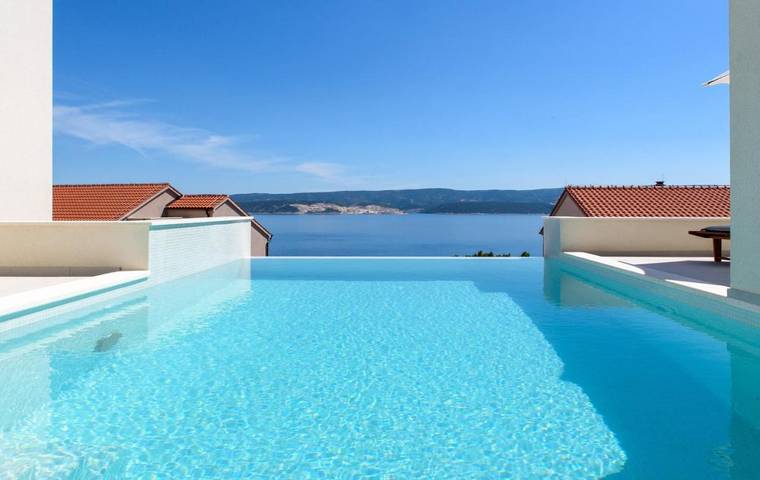 Appartement de vacances pour 6 personnes, avec Balcon et Terrasse ainsi que Piscine et Vue
