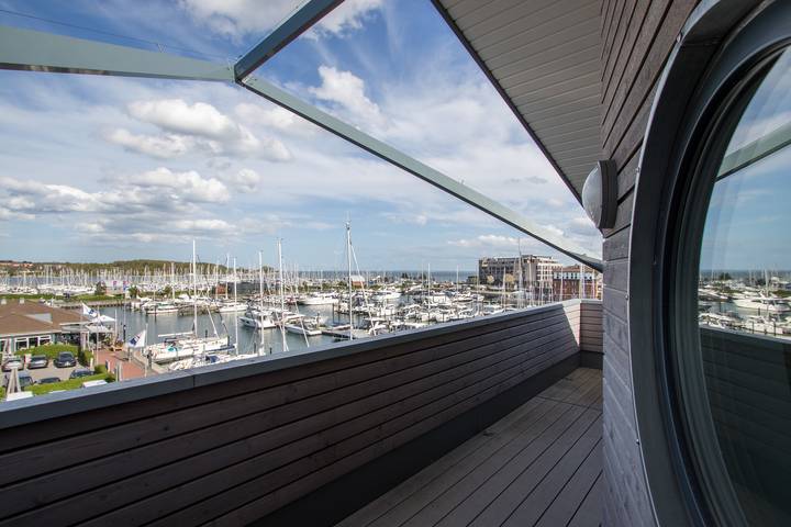 Ferienwohnung für 6 Personen, mit Balkon und Kinderpool sowie Sauna und Ausblick in Neustadt in Holstein