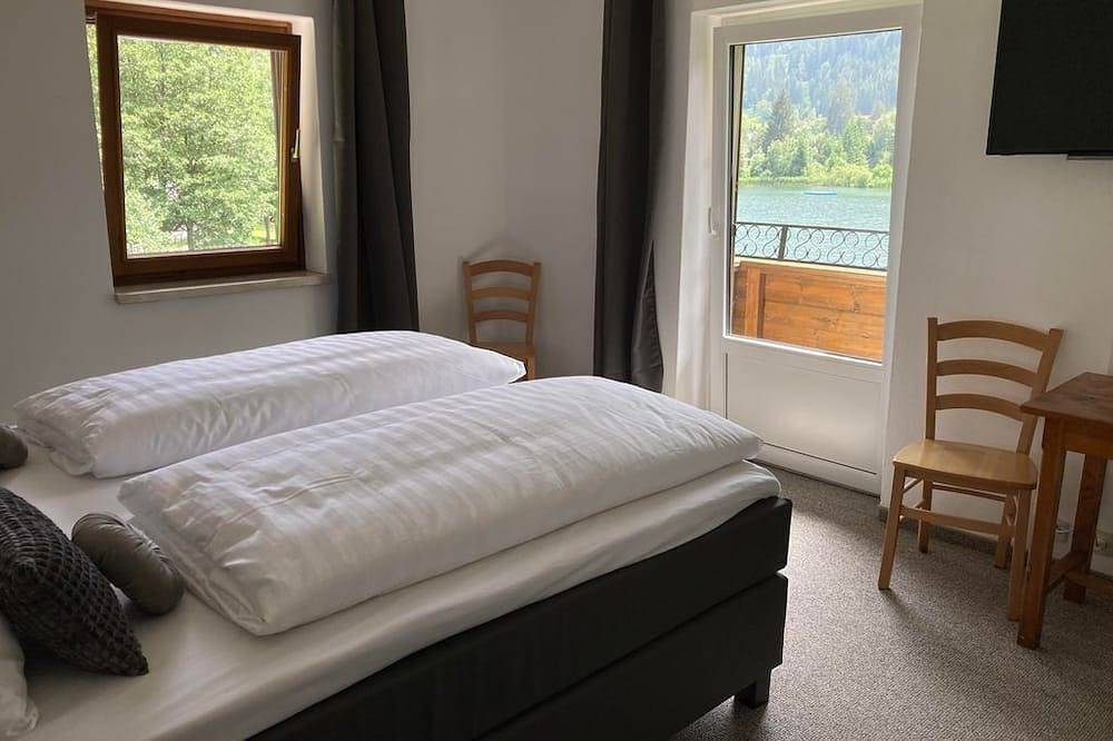 Doppelzimmer Seeblick, 2. Stock - Aparthotel Seebrauer am Afritzer See in Feld am See, Villach-Land