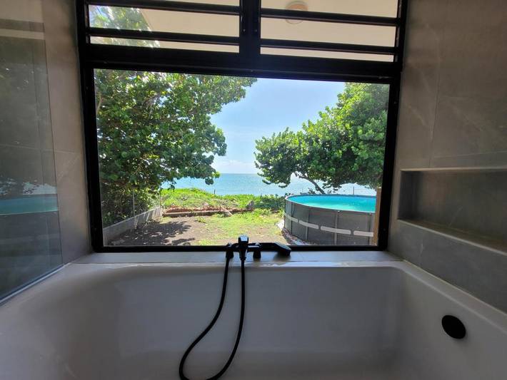 Location de vacances pour 6 personnes, avec vue ainsi que jardin et piscine dans Mahina - 2