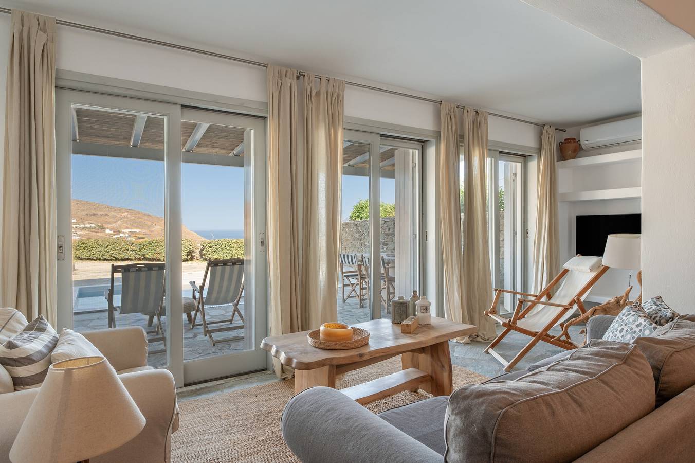 Ferienwohnung in einem Hotel 'Anemos Suite mit privatem Pool' mit Meerblick, Wi-Fi und Klimaanlage in Tínos