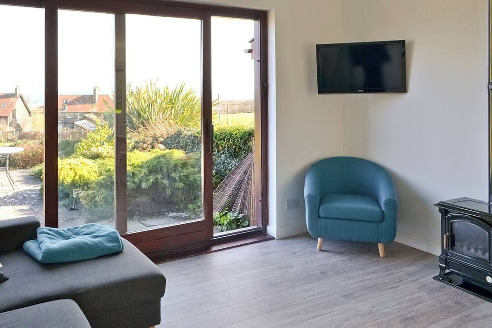 Part of a small terrace of bungalows with uninterrupted views towards the sea. in Embleton, Northumberland