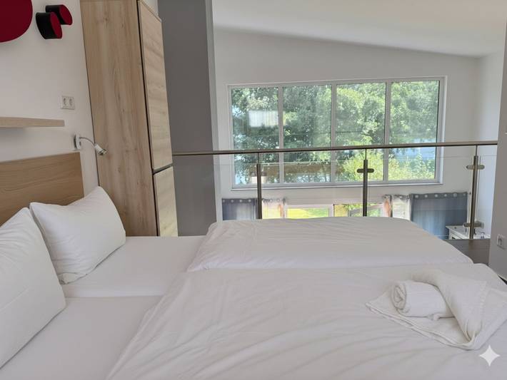 Ferienhaus für 4 Personen, mit Terrasse und Garten sowie Ausblick und Seeblick in Krakow am See - 2