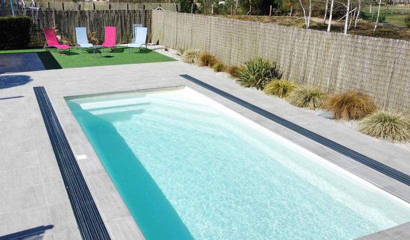 Appartement de vacances pour 4 personnes, avec Terrasse ainsi que Jardin et Piscine