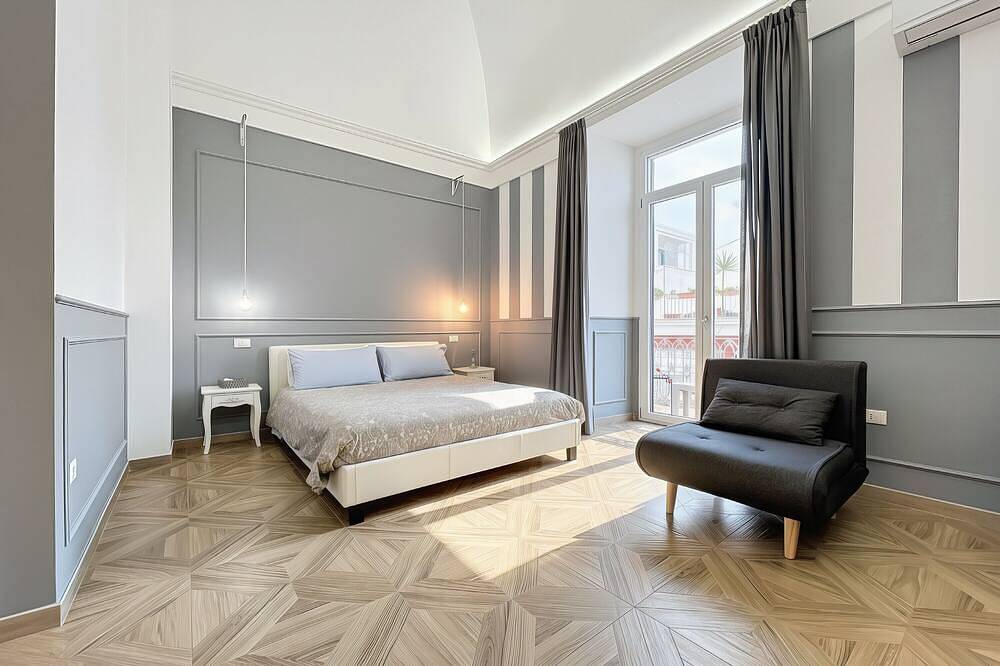 Bed and Breakfast 'Camera Queen - Orchidea Celeste' con Vista Mare, Wi-Fi e Aria Condizionata in Manfredonia, Gargano