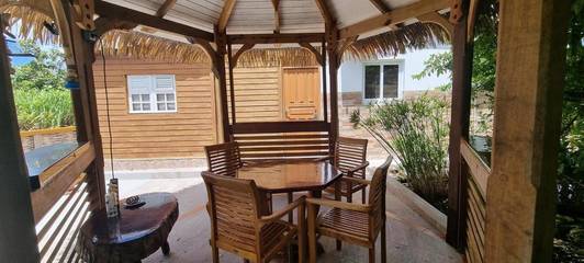 Maison d’hôte pour 4 personnes, avec jardin et vue dans Marie-Galante