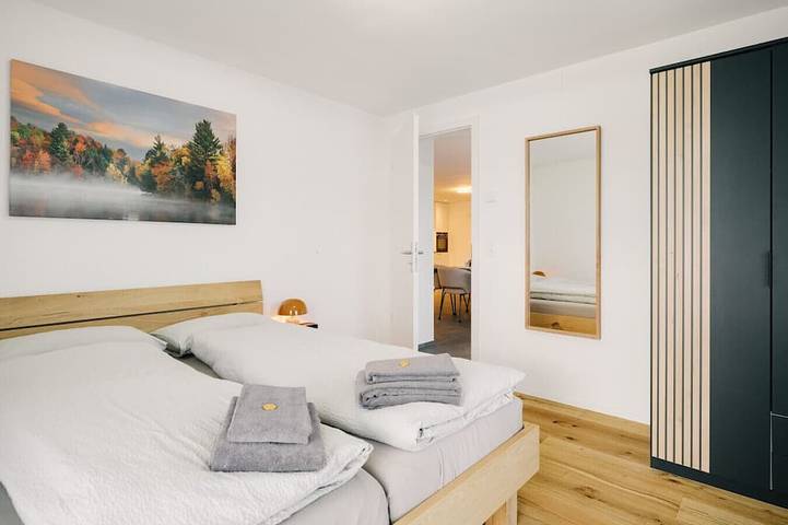 Ganze Wohnung, Apartment Niesen near lake & mountains, modern in Einigen, Spiez