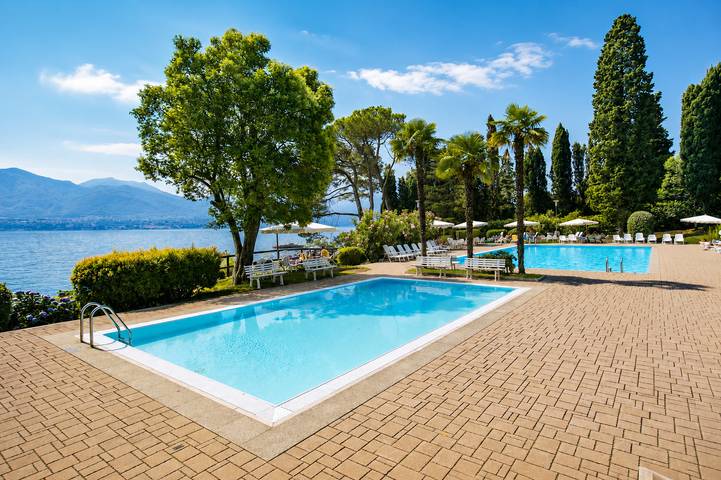 Ferienwohnung für 2 Personen, mit Balkon und Kinderpool sowie Pool und Seeblick